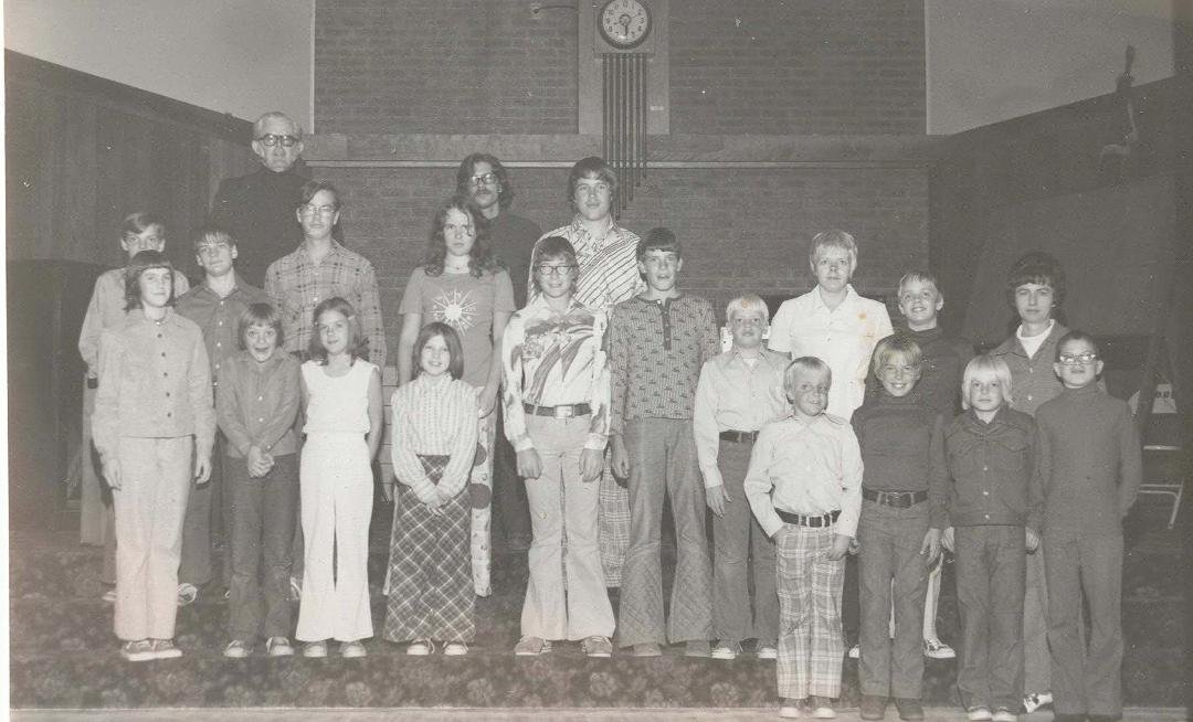 Elks Lodge in 1974 or 1975. Mom and we three brothers are to the right. P-M Photography.