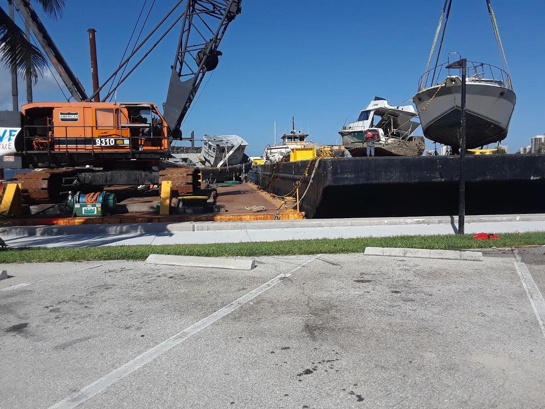 Abandoned and heavily damaged boats picked up by salvor in Palm beach county ,all from Hurricane Irma.to be junked.