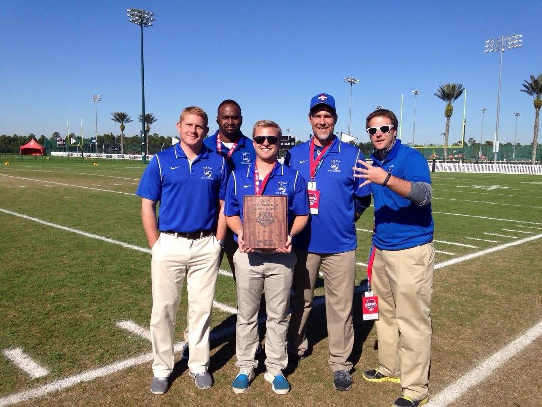 The best coaching staff in the country. At the ESPN Wide World of Sports at Disney World for the Pop Warner National Championship Tournament.