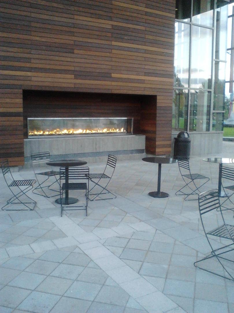 My son sent me this picture. This is the new campus library fireplace.  It is seen both inside and out.  My college didn't have one of these did yours?
