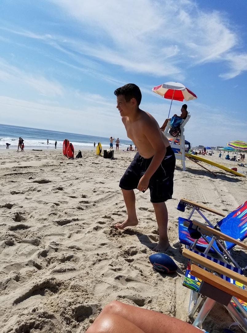 Heading into the water...enjoy Lavallette...