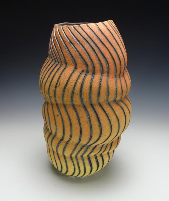 pinched line piece, 13" T colored slips and oxide stain, fired to cone 2
