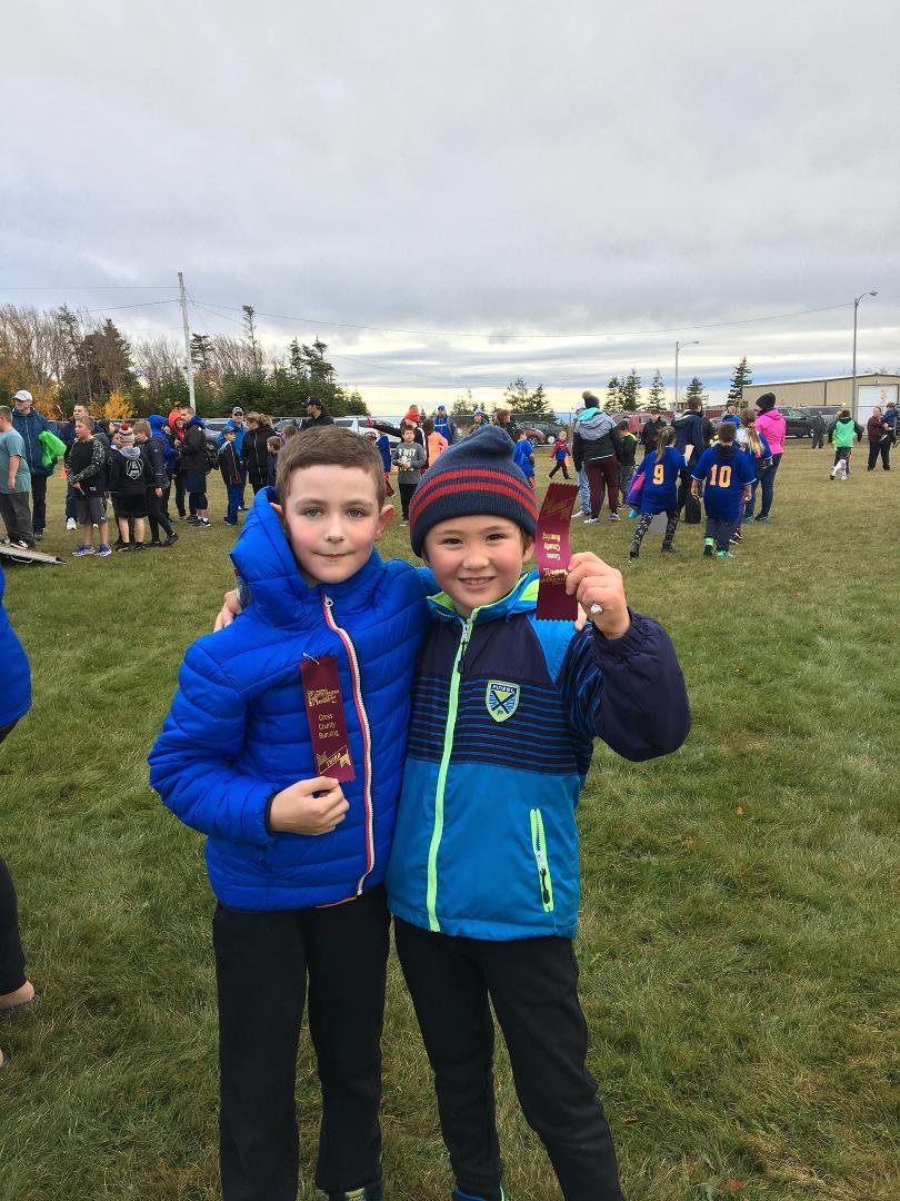Kay & Jake with their cross country ribbons