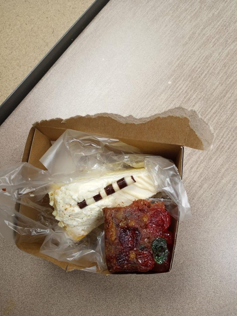 Xmas Snack: Some kind of exotic cheese cake with fruitcake on the side with a cup of Java to boot, Let's start this day off righteous!!