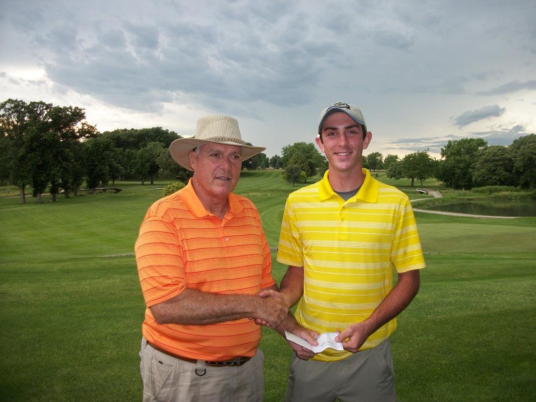 Russ congratulating Conlan Callahan, a 2014 Seneca H.S. graduate & former member of the SHS golf team. He is the recipient of the Matt Rivett Scholarship Award. He will use the $1,500 scholarship towards attending Lincoln C