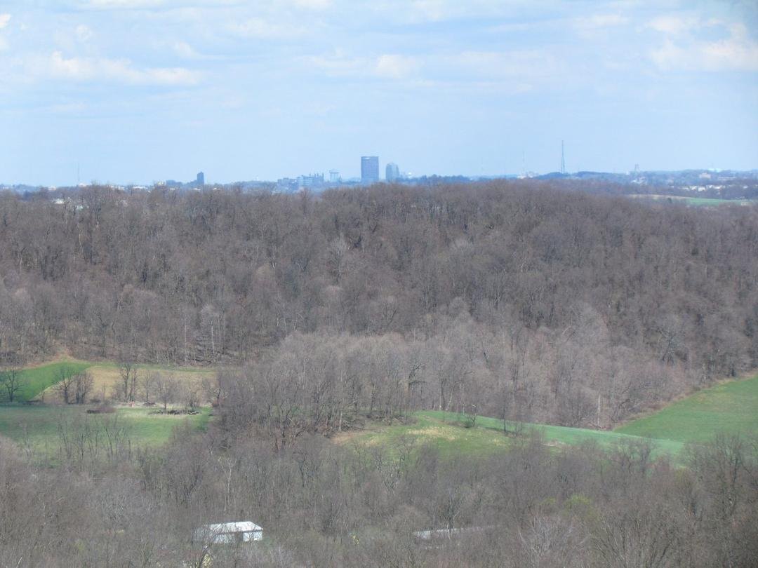 Across Washington County farmland and woods you can see downtown Pittsburgh buildings.