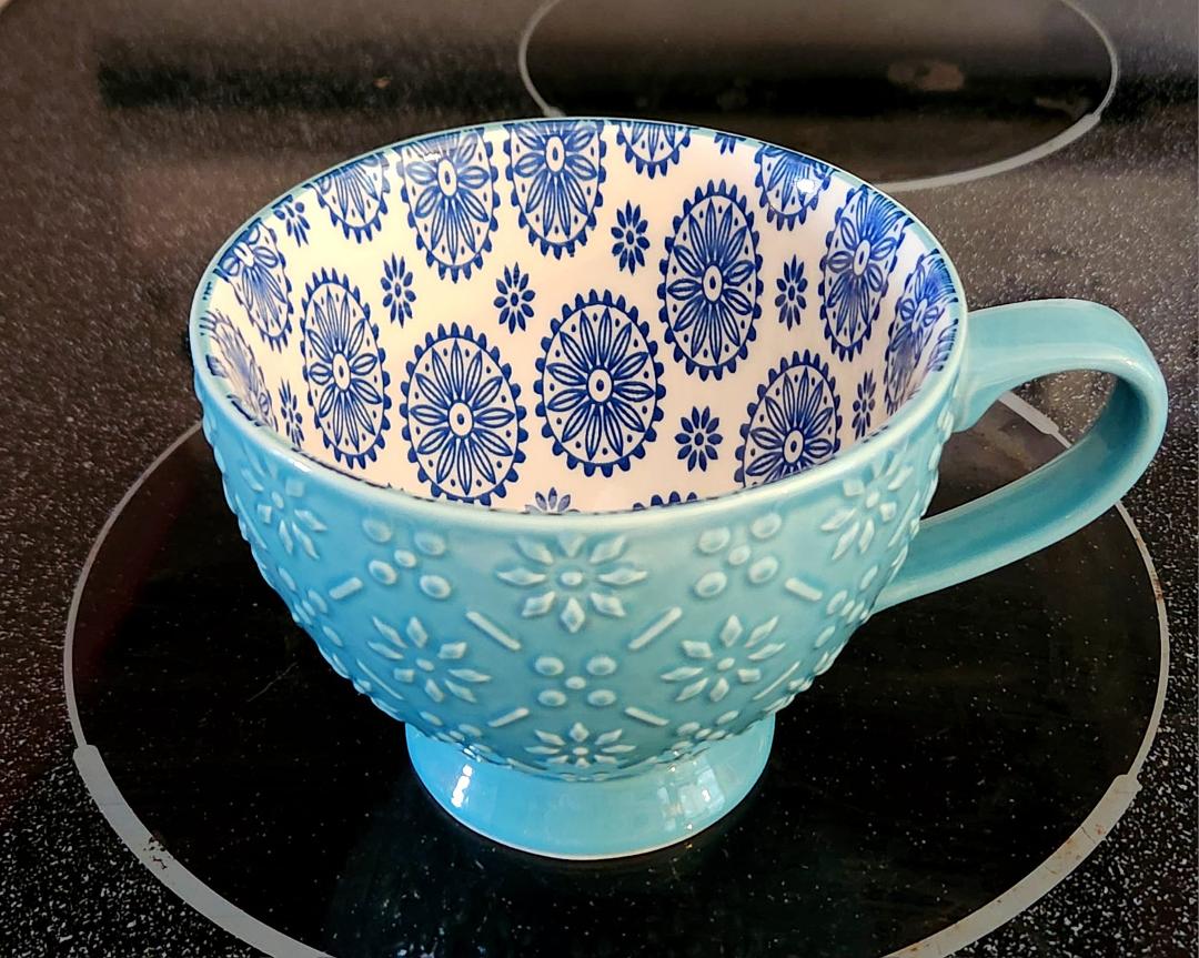 Descaling my Keurig and eagerly awaiting a cup of coffee from my pretty mug!