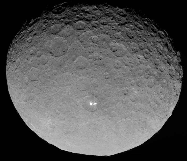 Dwarf Planet, Bright Spot
Image Credit: NASA, JPL-Caltech, UCLA, MPS/DLR/IDA
Explanation: Now at Ceres, Dawn's camera recorded this closer view of the dwarf planet's northern hemisphere and one of its mysterious bri