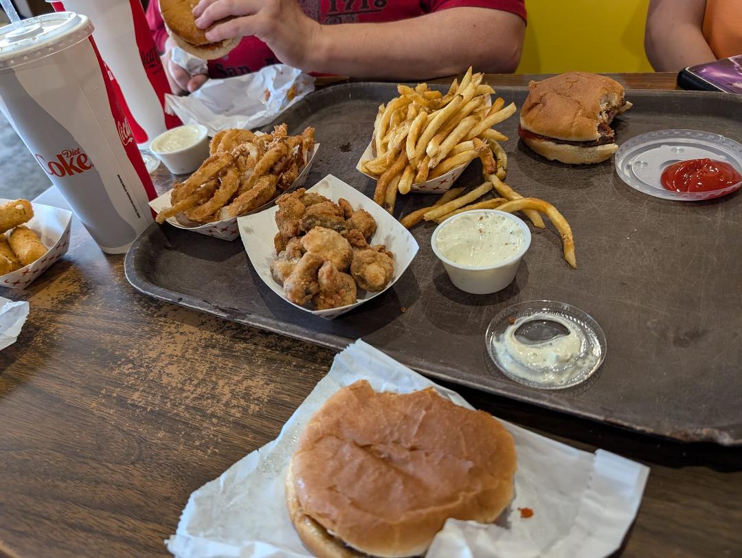 Pizza burger, fries, onion rings, and mushrooms.... thank you Mac's Drive-in.