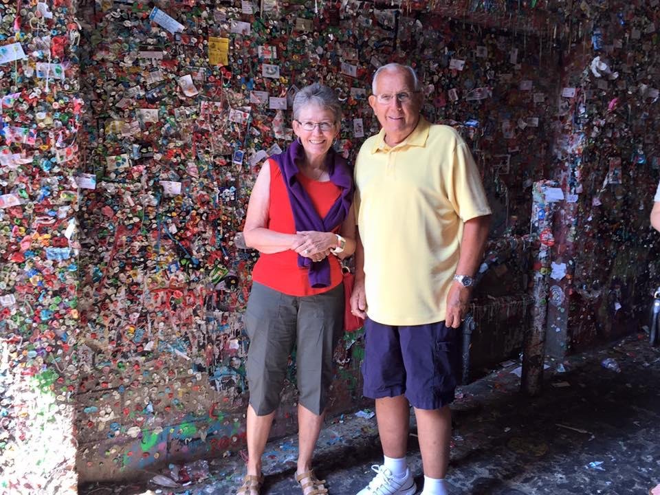 Pat and my brother at the "used"chewing gum wall at Pike street market in Seatle