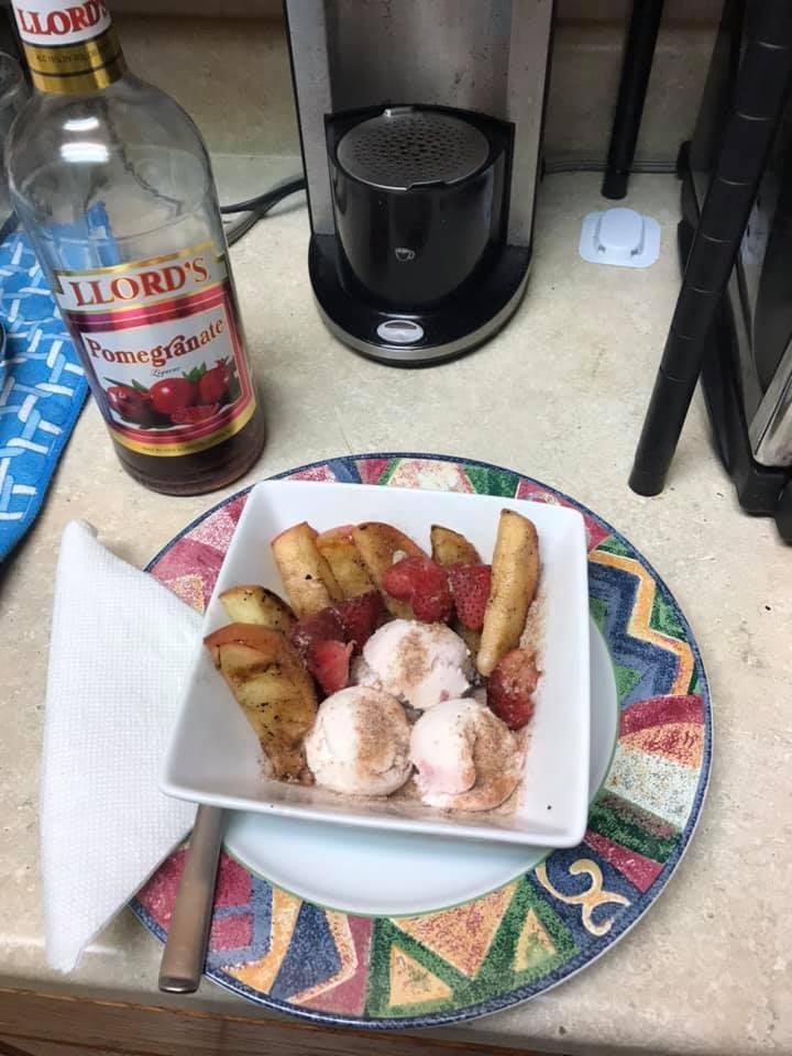 Bbq desert...apples marinated in Brady then grilled and to with lite honey glaze / cognac strawberries