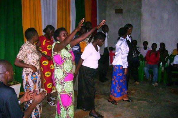 Choir singing and worship in an evening service.