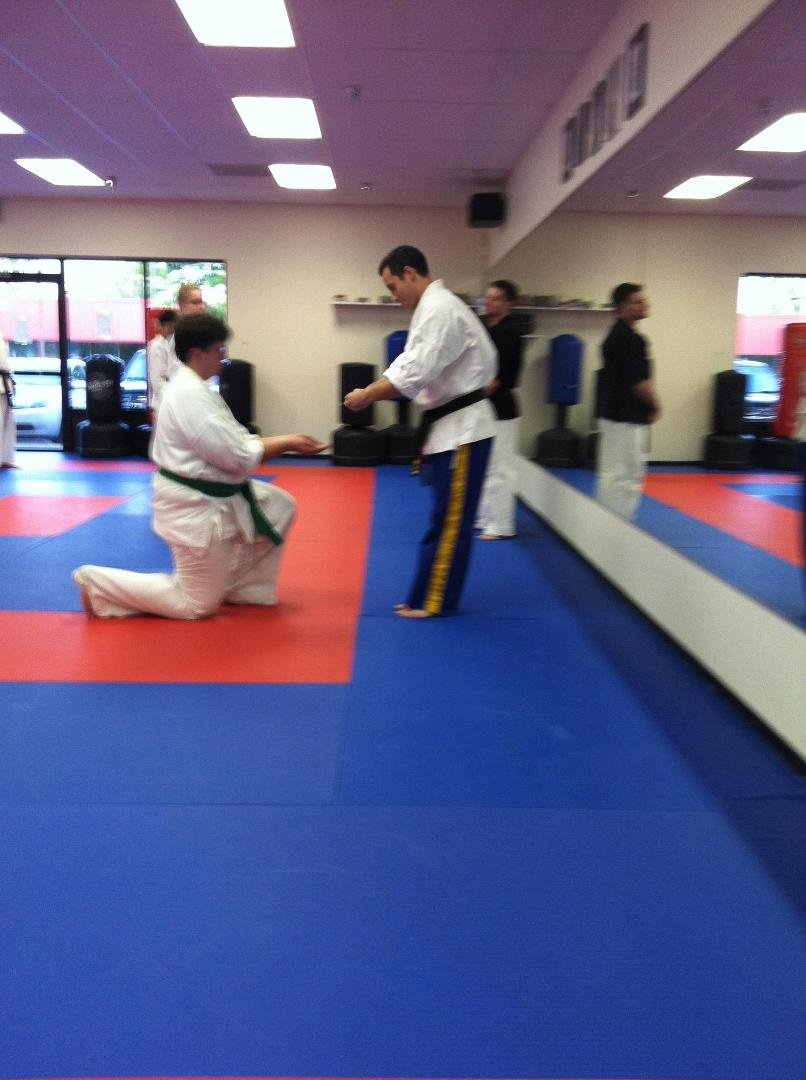 Duane receiving his 2nd brown stripe