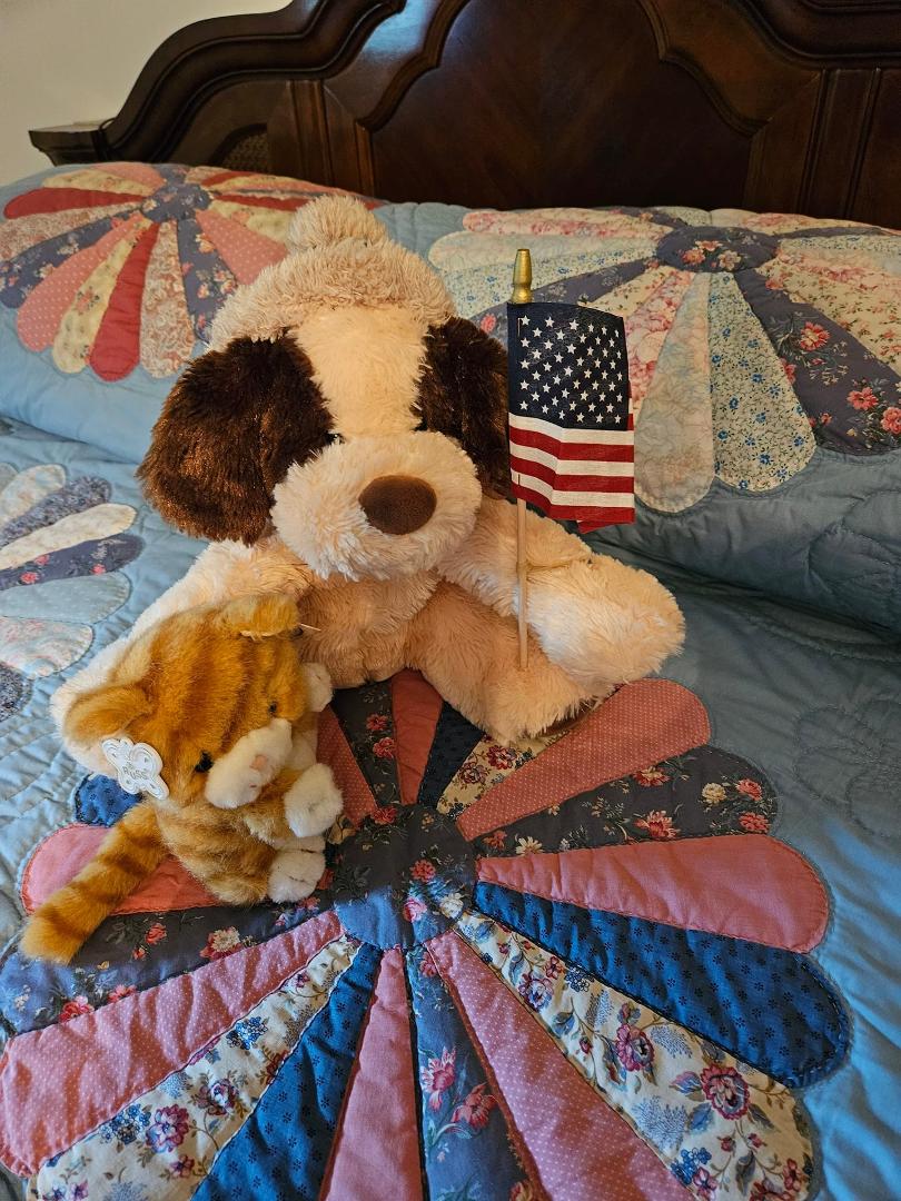 Happy 4th of July from Jerry Lee, his pet and his owners, Fay and Felix