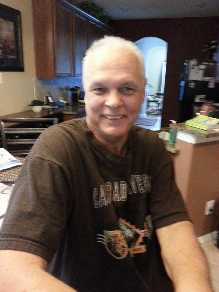 Since kenneth's hair is falling out from chemo, he decided to get a burr haircut. I have to get used to it. He doesn't look the same.
