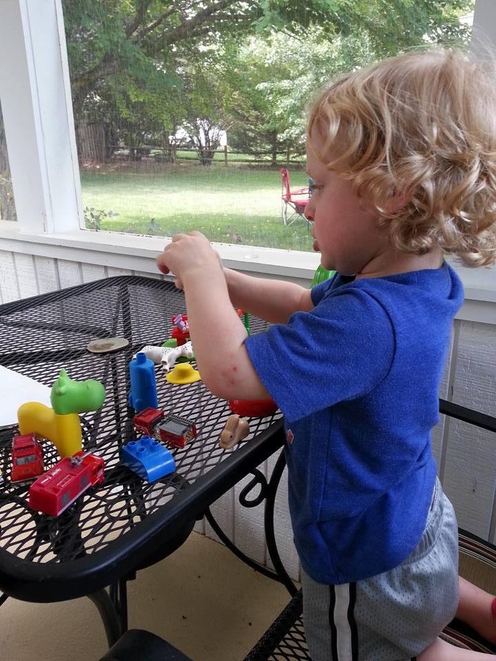After a swin it's playtime on the porch.