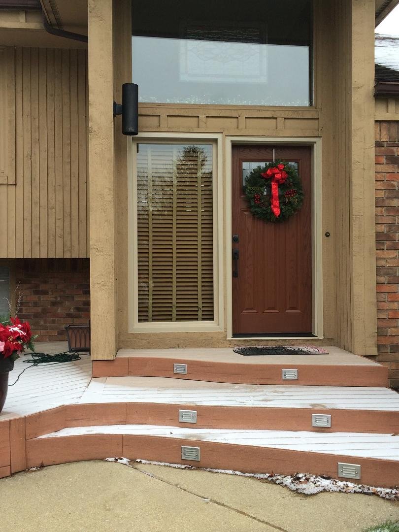 New front door, finally! The inside is a deep mahogany, but it's hard to tell from the photos.