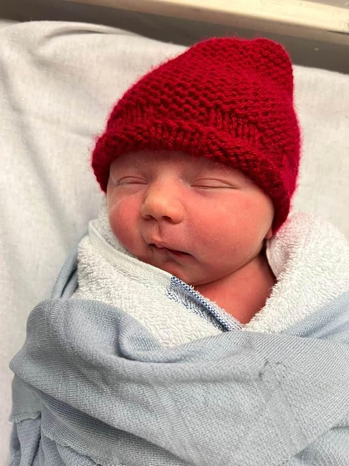 He definitely has Melanie’s cheeks!