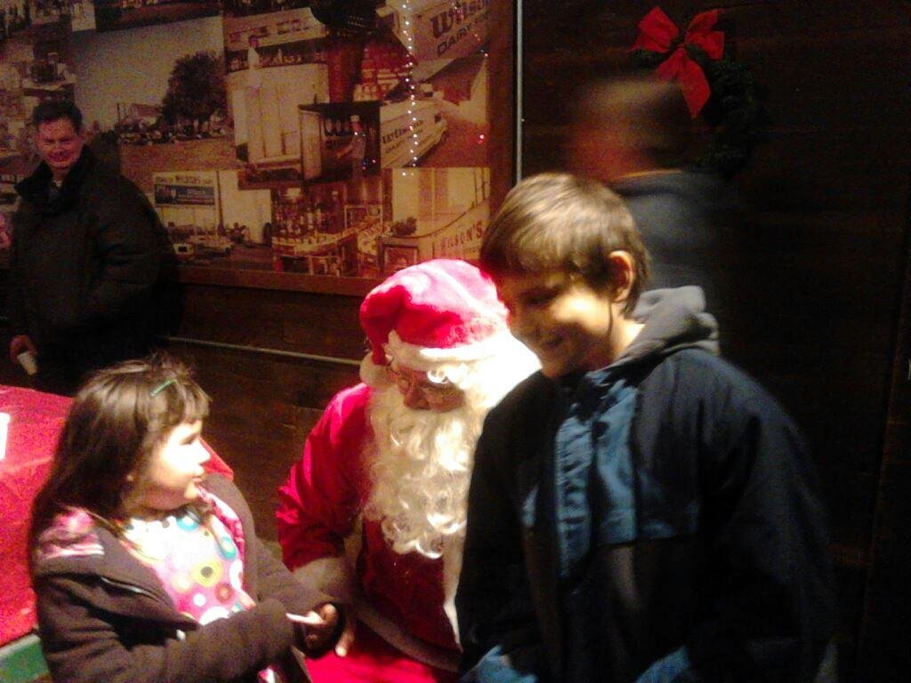 Connor and Adriannah at the Wilson Barn in Livonia for caroles and Santa