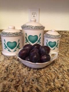 neighbor gave plums from his tree..yummy!