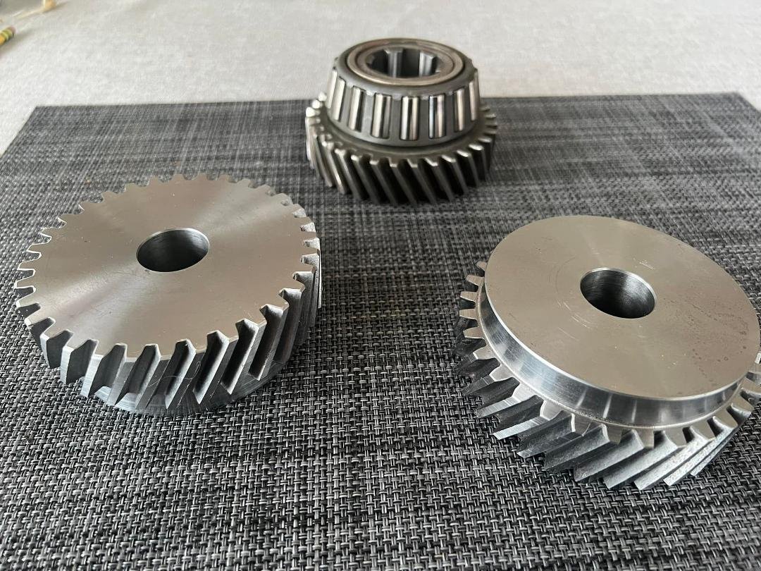 After several years of trying to find the correct gear to install the vertical head on my milling machine the only solution was to make them. I turned the blanks and with the help of Bill Nicholson the blanks were sent to a