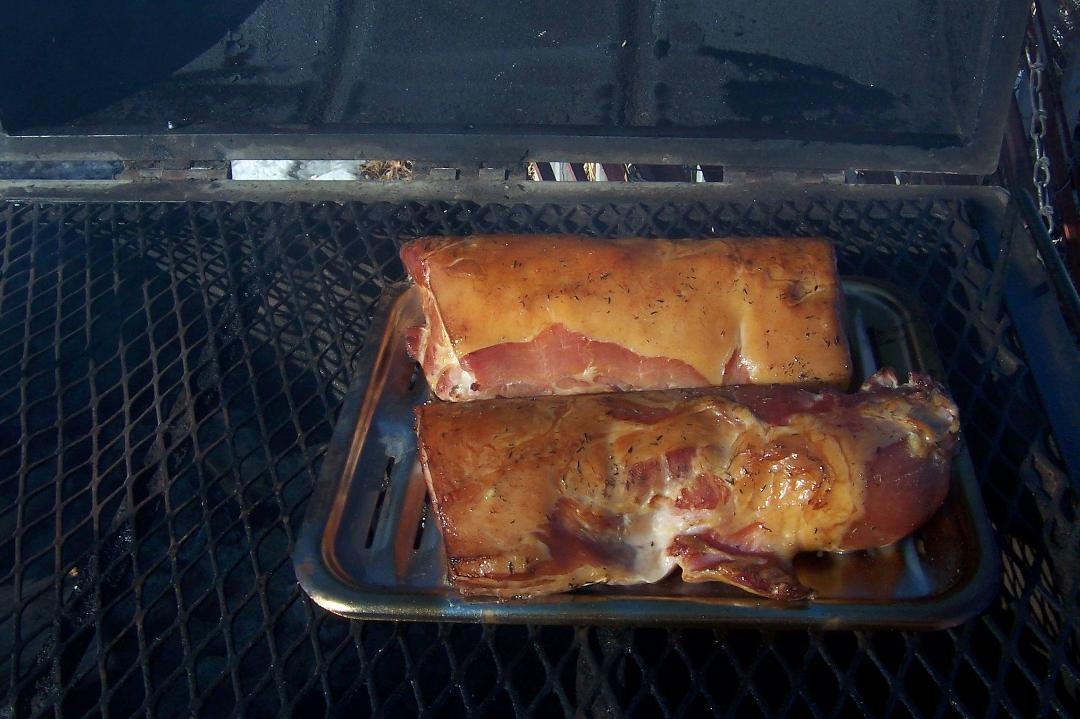 Oh Boy , canadian bacon half way there, 115 degree internal temp. another 1 1/2 hours, hmmm! Hickory smoked.