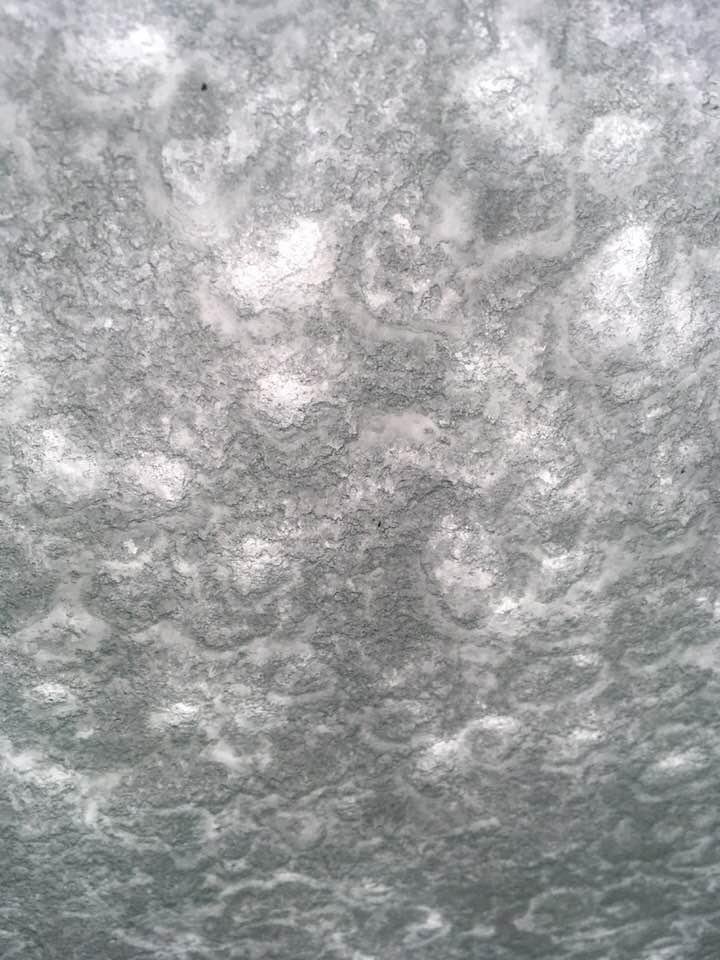 The snow pattern on my windshield from inside my car. Mitten love ❤️