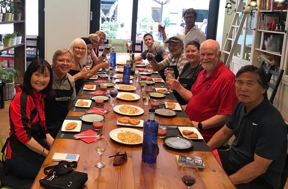Enjoying the "fruits of our labor" at Spanish cooking class which included delicious gazpacho, spanish omelet, seafood paella, tomato and garlic toast and crema de cataluna (spanish version of creme brûlée) for desert. Loc