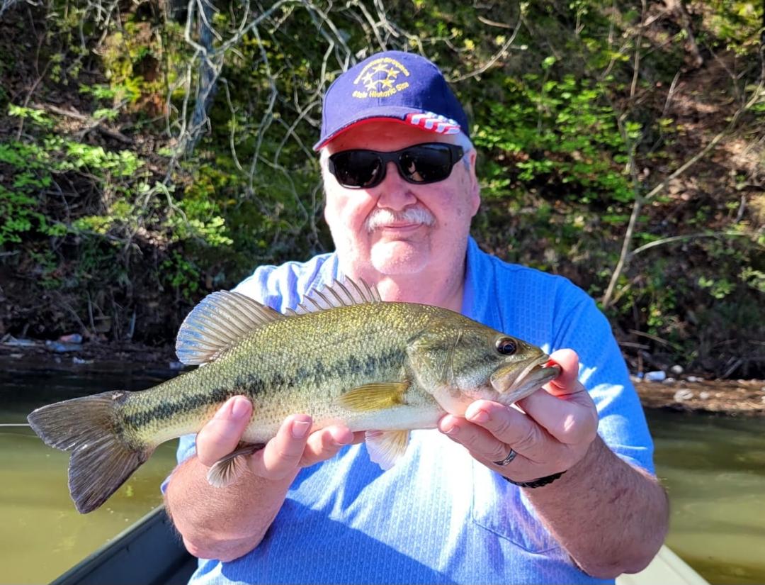 Out this morning with Lawrence Bates and his grandson at Waterloo Lake. My first Texas bass, 14 " HAD TO TOSS IT BACK.