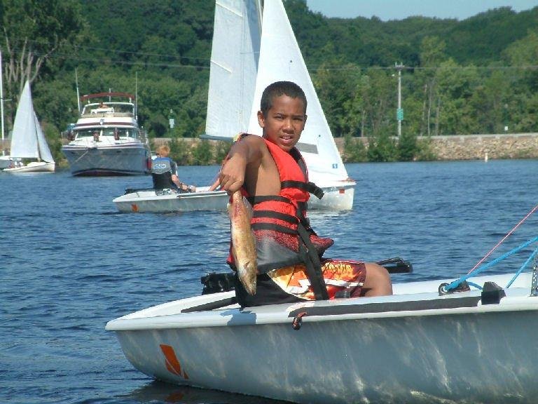 Anyone want to guess how Alex caught this fish with his hands in the middle of sailing lessons on the St. Croix river?