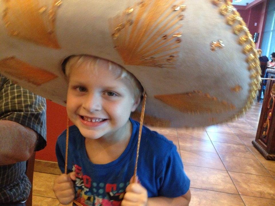 Eating chocolate donuts is a favorite activity at Paw Paw & Grammy's house!
