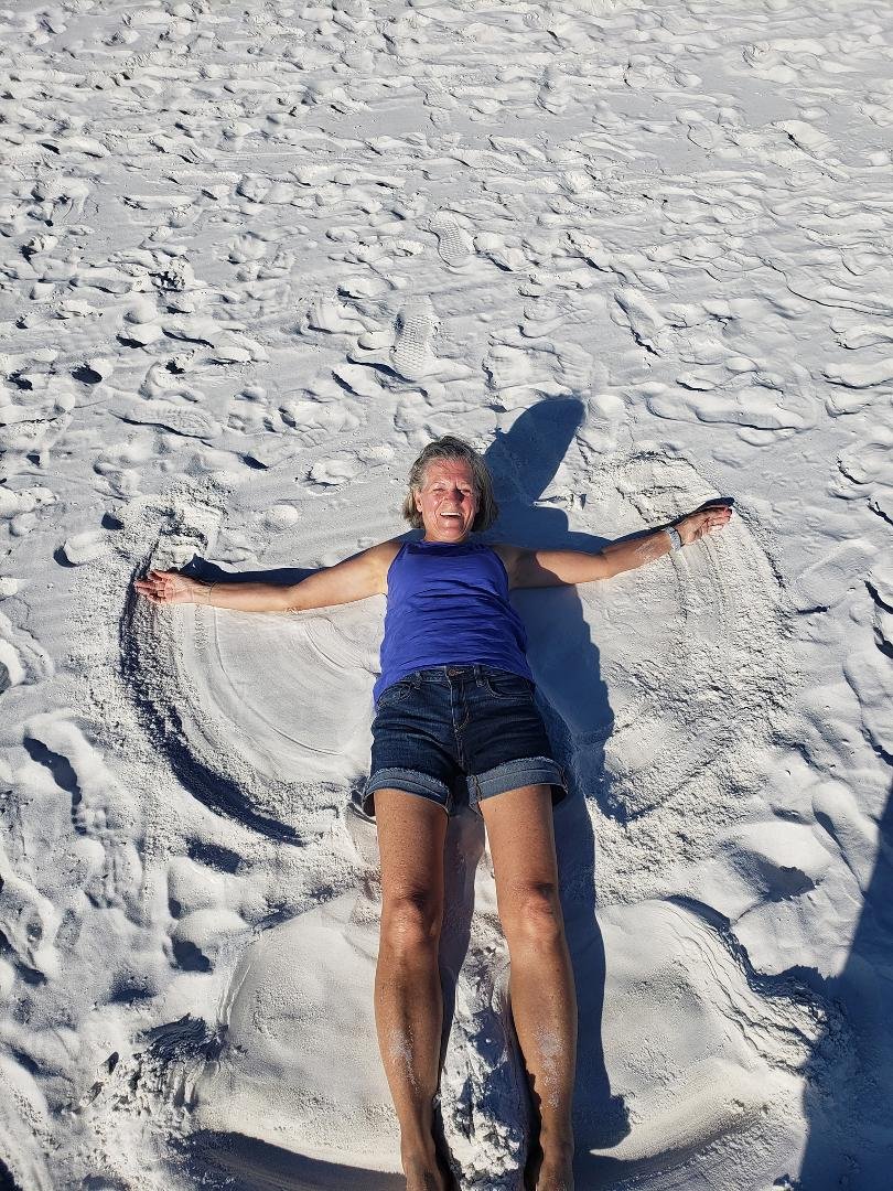 Its what you do when the sand is as white as snow, you make a sand angel.