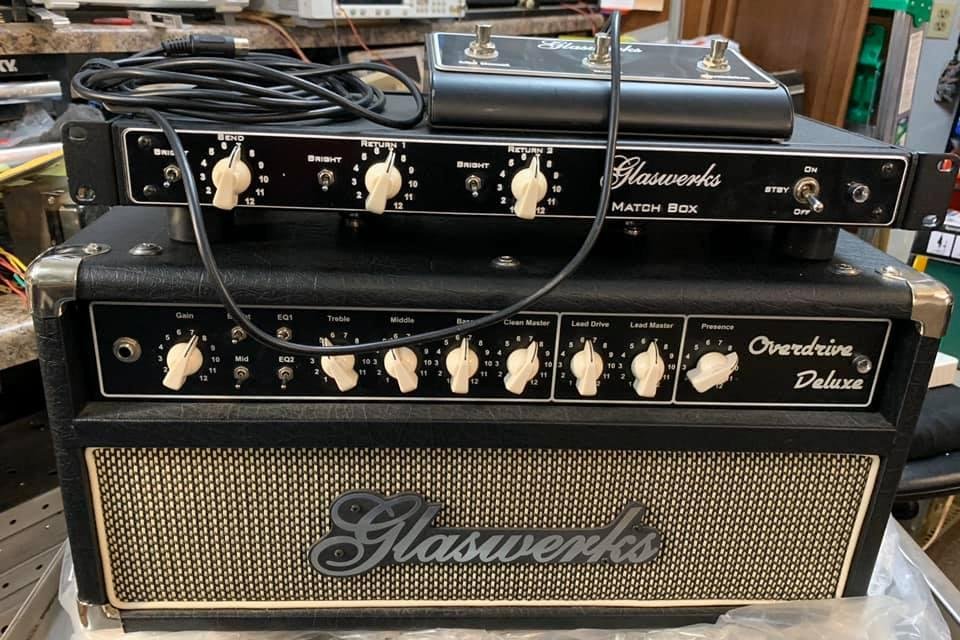 Available for immediate shipment.
Glaswerks Overdrive Deluxe 100w 102 tuning with
Glaswerks Matchbox external effects interface. Both units are in mint condition. Only used as demo units and have been gone through to in