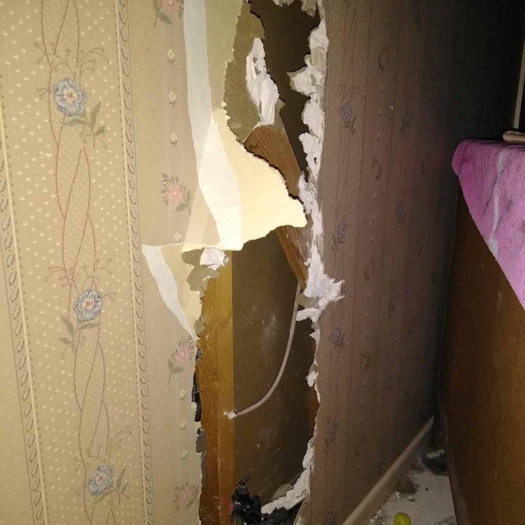 Part of the wall that caught on fire.