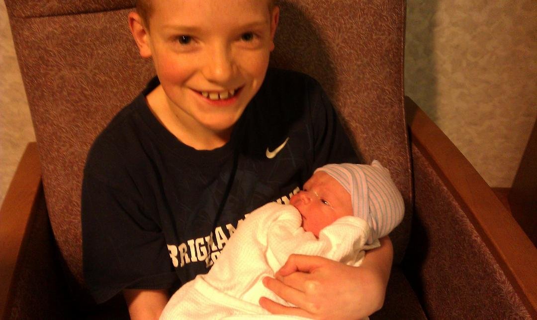 Andrew is a happy big brother!
