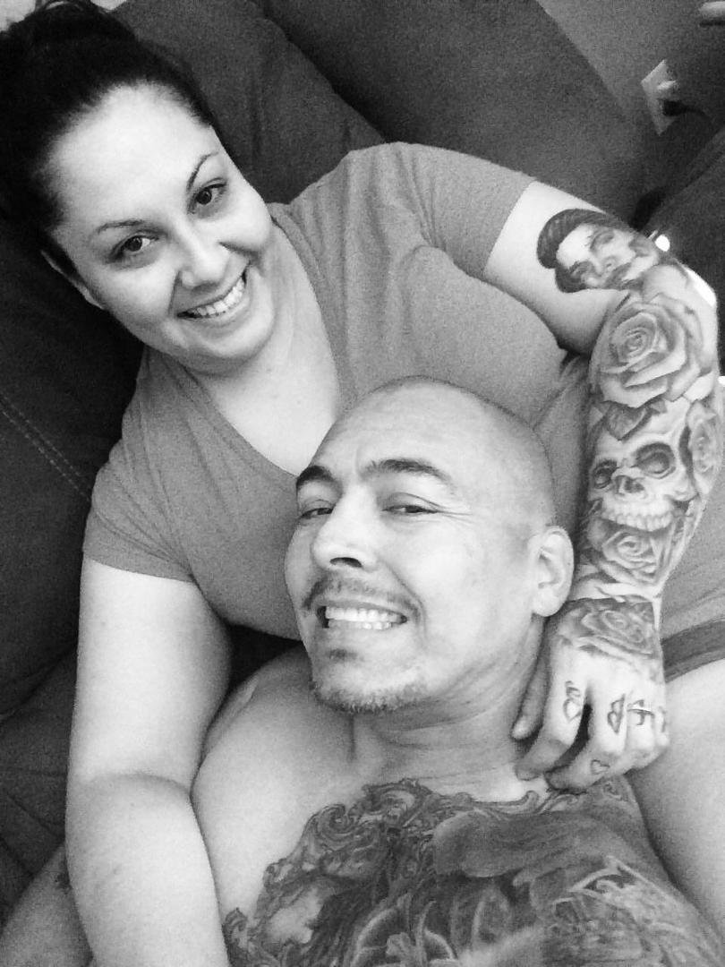 Me in my comfort zone , my lady's arms. Good day peeps oldies and tattoos. God bless