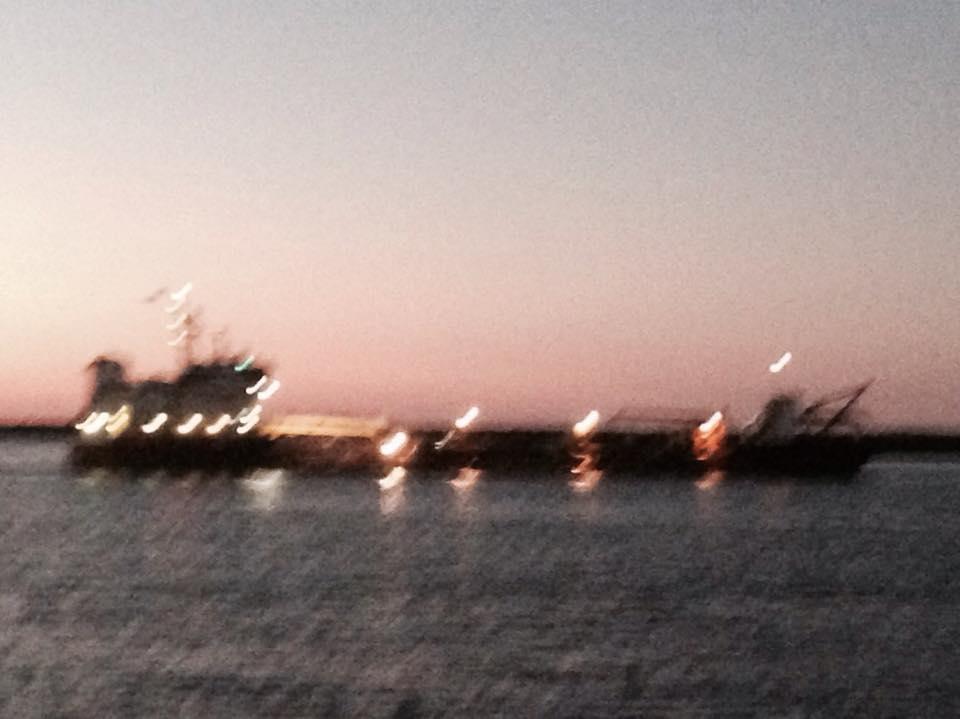 Working barge headed out to sea tonight all lit up.