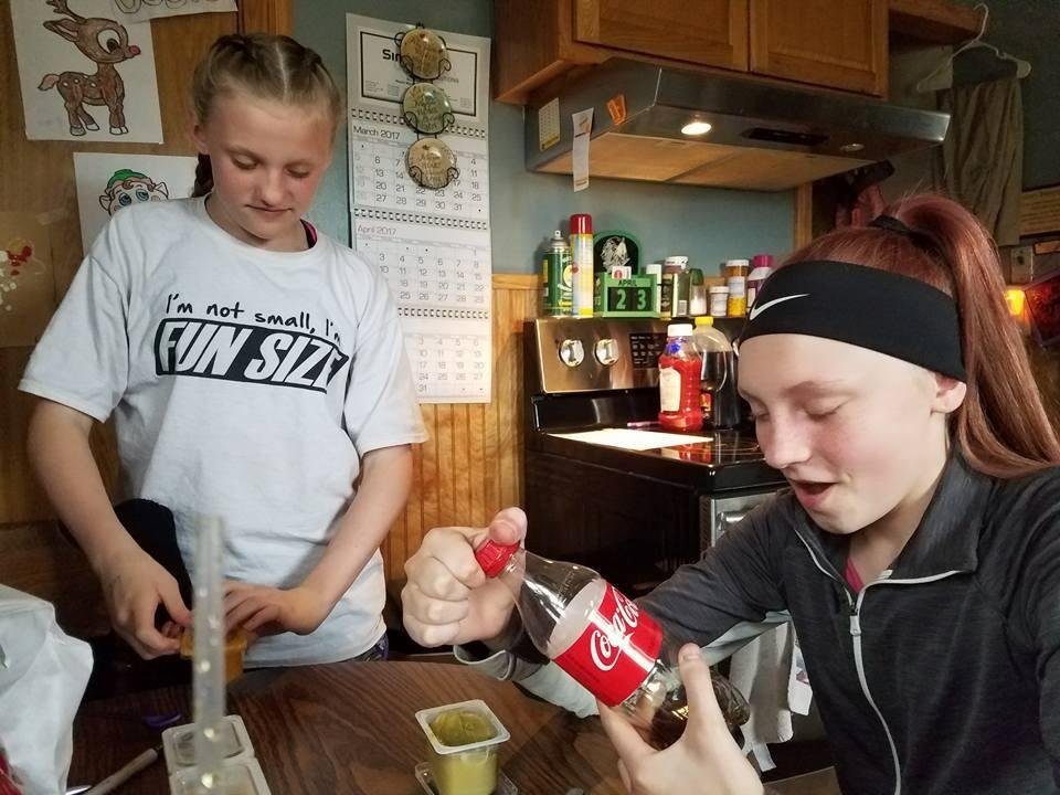 They are playing with baby food. And trying it out