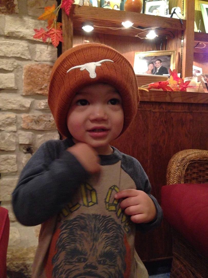 Lincoln came over to play with Grandpa's trains last night. Took some coaching, but Diane Calmes got him to put on Grandpa's UT sock hat. He's a sweetie!