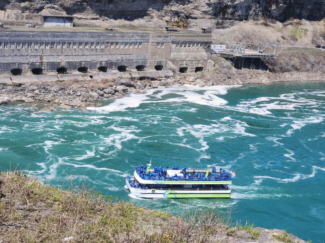 Maid of the Mist (no, I'm not a passenger). Isn't the water beautiful! (Niagara Falls Power Station in back)