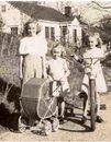 My three sister and me in the buggy