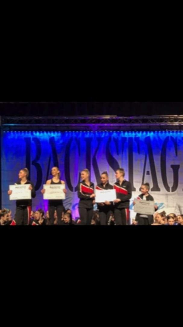 Avery. Far right. First award.