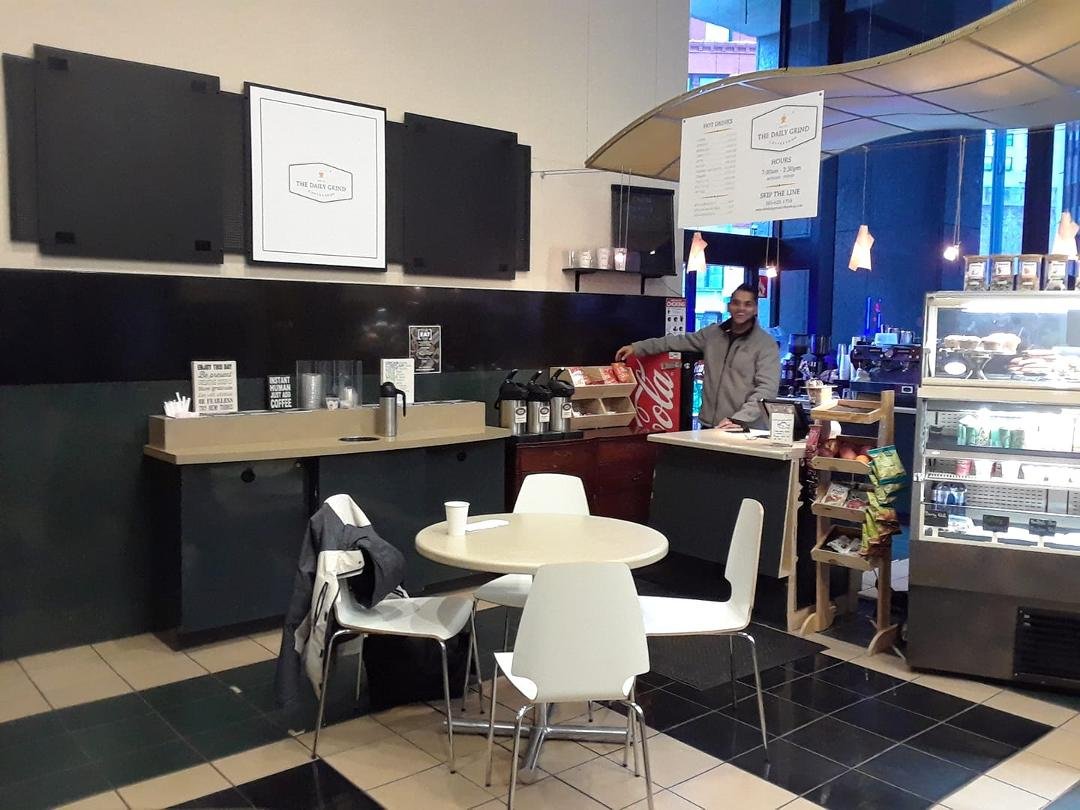 Neat little coffee shop in the Crossroads Bldg. (downtown Rochester). One of my hangouts. :-) Name: The Daily Grind
