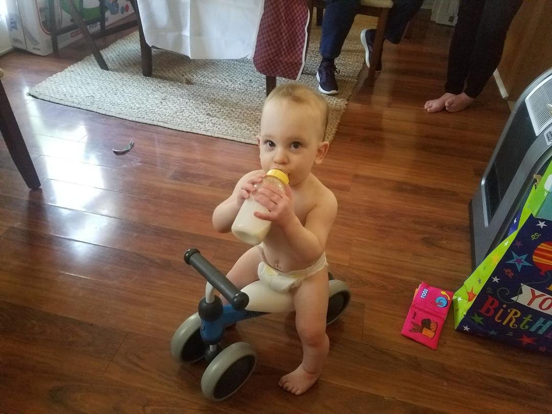 My grandson, Quinn's first birthday on 2/3/19 and his first trike.😁🤗