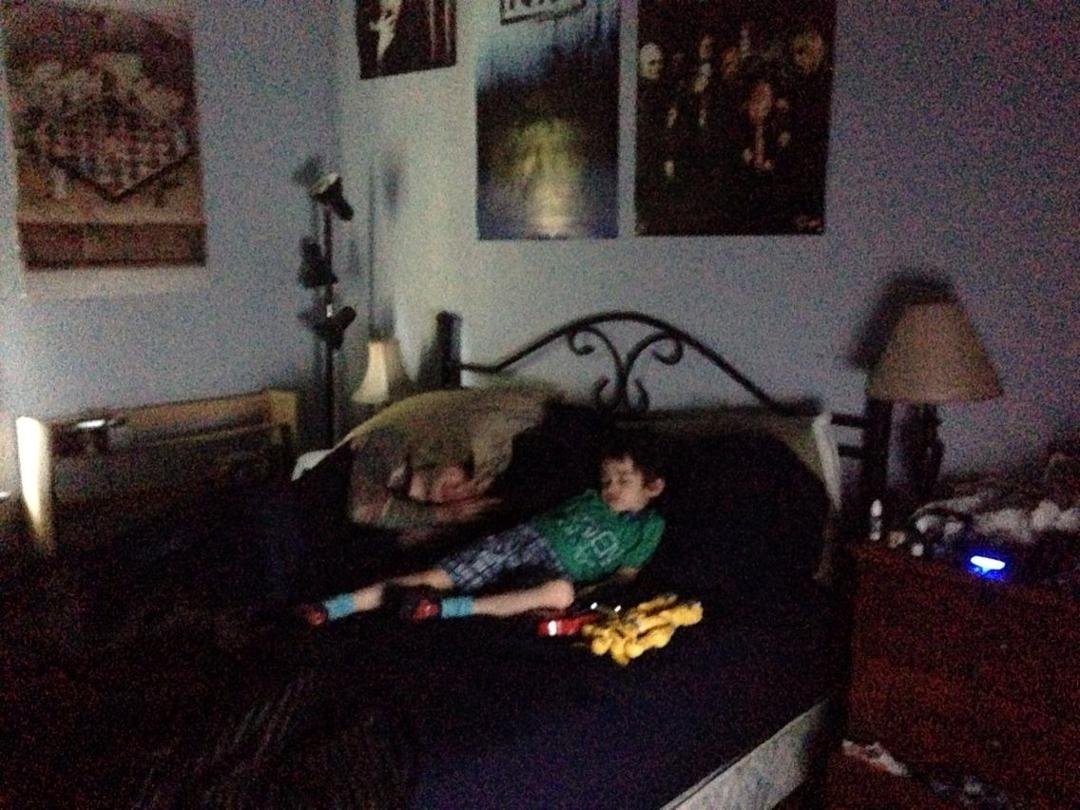 Father and Son watching a movie.