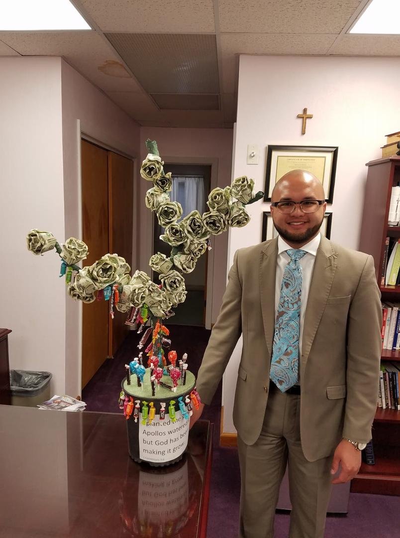 To the 7th senior pastor of Community Baptist Church, from the members of the CBC food bank your vary own money tree. For all those who said money don't grow on trees take a look at this tree.