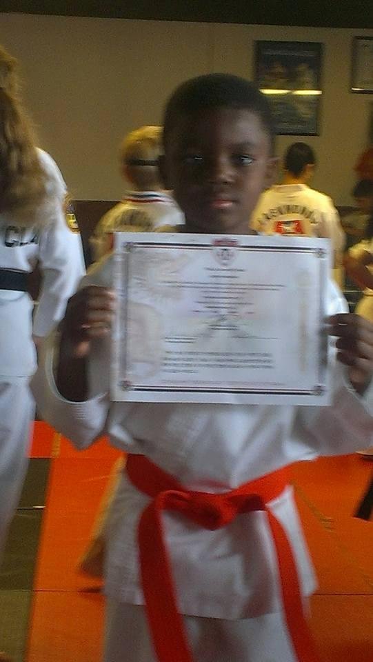 Jariyah got his Orange belt in Taekwondo today!