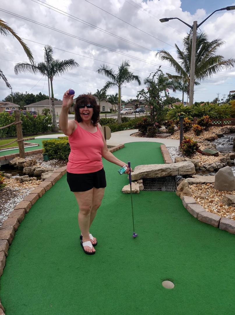 We were playing miniature golf, I got a hole in one. :)