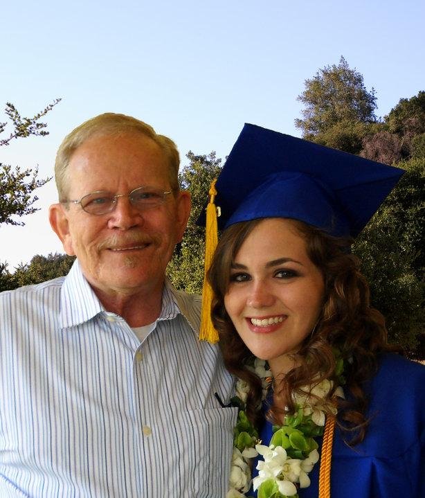 I did a little Photoshop-ing and added a background to the image I posted earlier of Katey and myself. This is one of my favorite images of the young lass and felt it needed a nicer background. Hope she likes it. Proud o