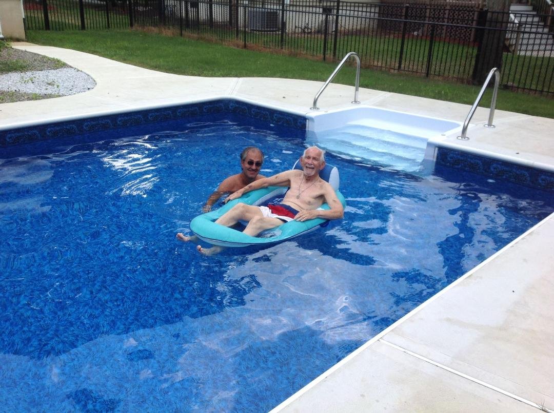 Uncle Jackie and David enjoying our pool!